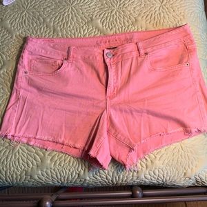 Coral cutoff shorts